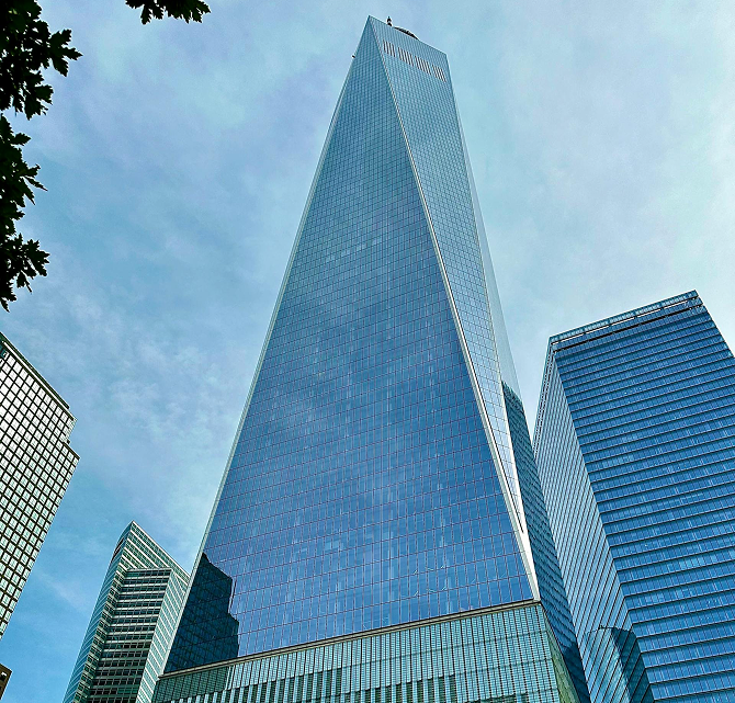 low-angle-shot-tall-city-building-with-blue-sky-background-new-york 4