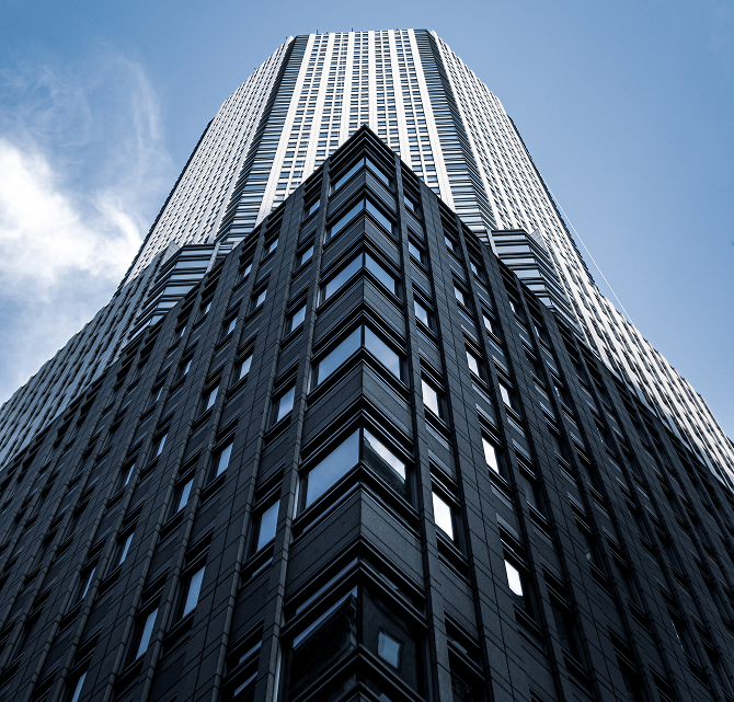 low-angle-shot-tall-city-building-with-blue-sky-background-new-york 5